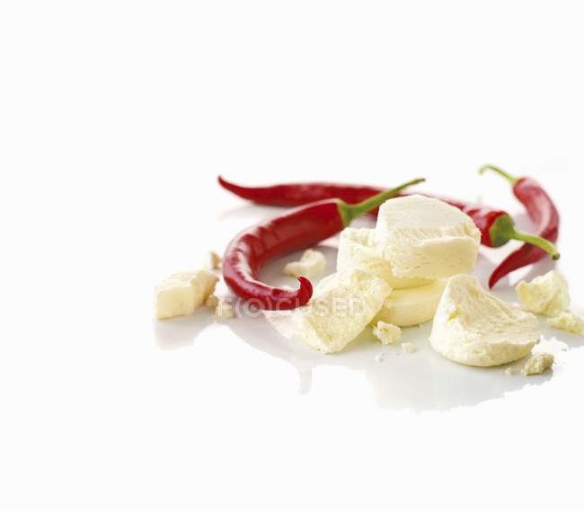 Goat cheese and peppers — Stock Photo