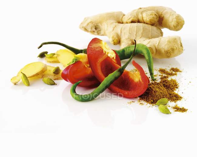 Ginger, pepper, chili pepper, curry powder — Stock Photo