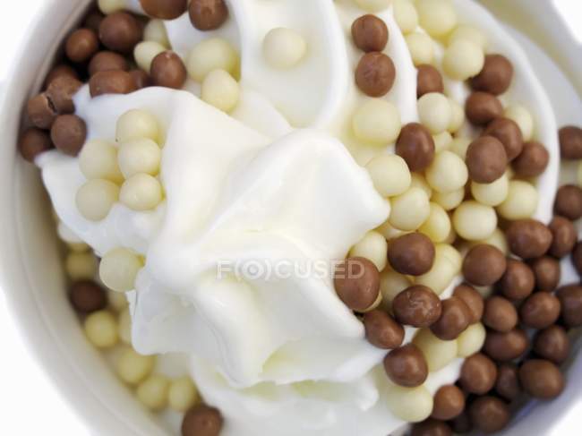 Ice cream with chocolate balls — Stock Photo