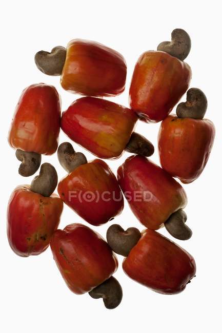 Red ripe apples with cashew — Stock Photo