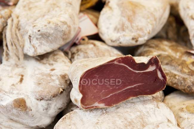 Raw ham pieces — Stock Photo