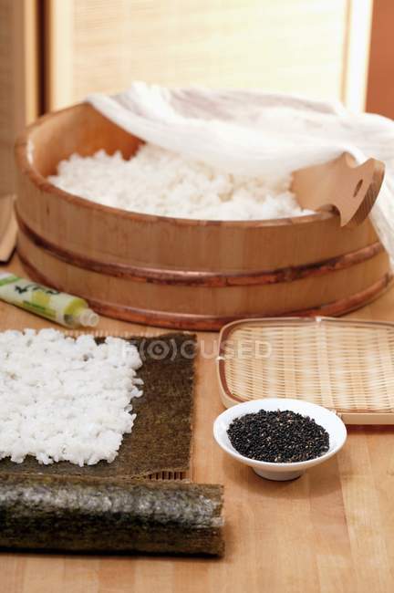 Rice on nori sheet — Stock Photo