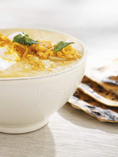 Pumpkin soup with grated cheese — Stock Photo