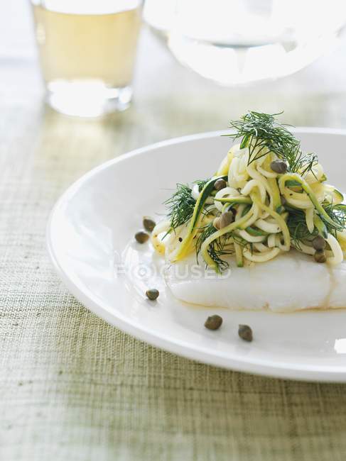 Cod fillet with spaghetti — Stock Photo