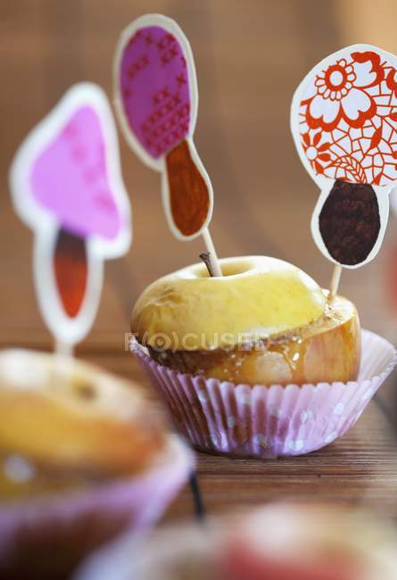 Closeup view of toffee apples with stickers — Stock Photo