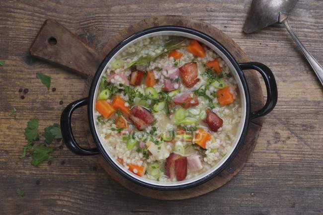 Barley stew with bacon — Stock Photo