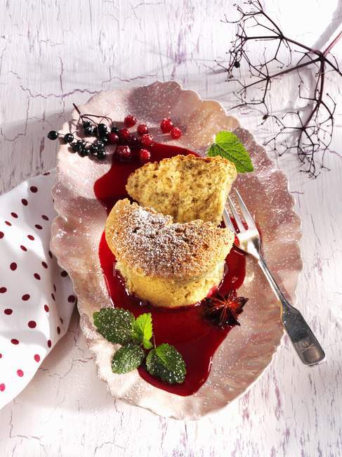 Buckwheat cakes with elderberry — Stock Photo
