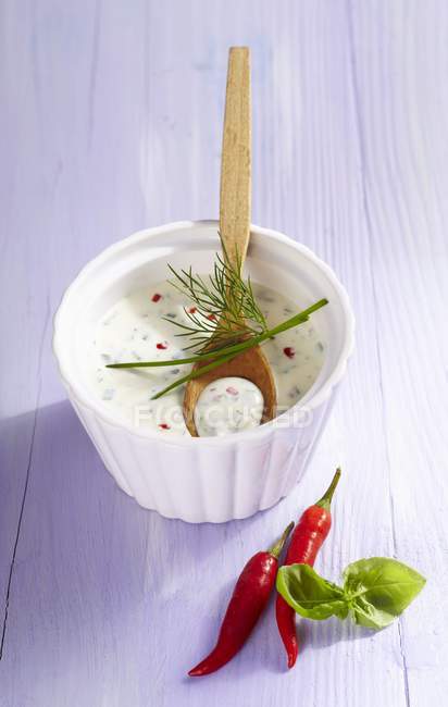 Elevated view of herb and quark dressing with chilli — Stock Photo