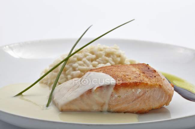 Grilled salmon with risotto — Stock Photo