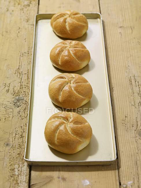 Quatro pães frescos — Fotografia de Stock