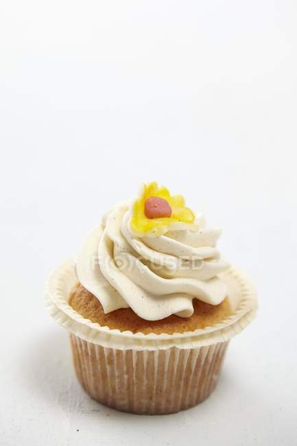Almond cupcake on white — Stock Photo