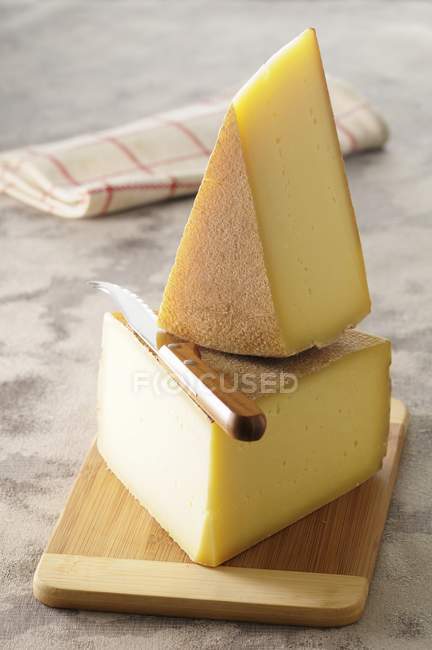Raclette cheese on board — Stock Photo