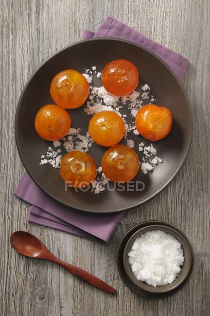 Candid clementines on plate — Stock Photo