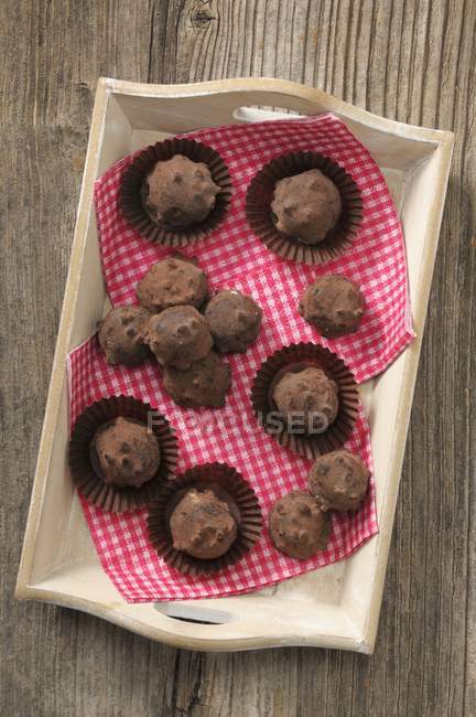 Truffle pralines on tray — Stock Photo