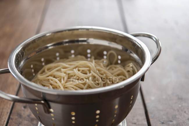 Cooked Spaghetti In Colander Background Traditional Stock Photo 147902399