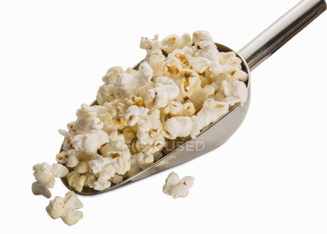 Metal scoop of popcorn — Stock Photo
