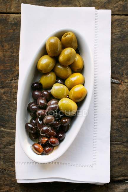 Black and green Marinated olives — Stock Photo