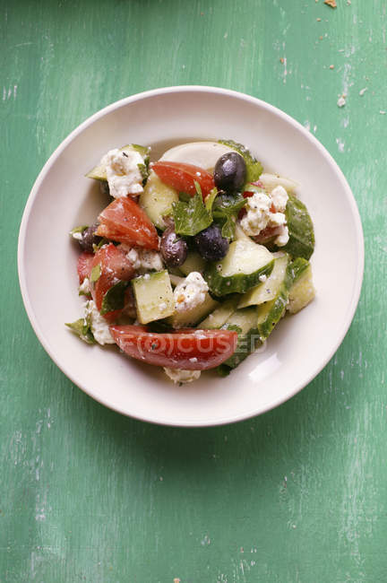 Greek salad on plate — Stock Photo