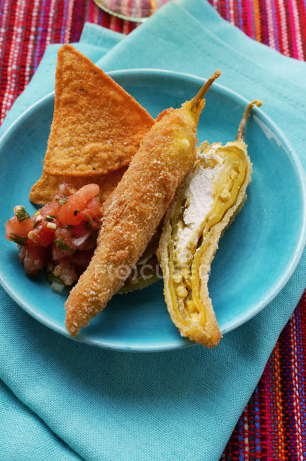 Breaded chillies with cheese — Stock Photo