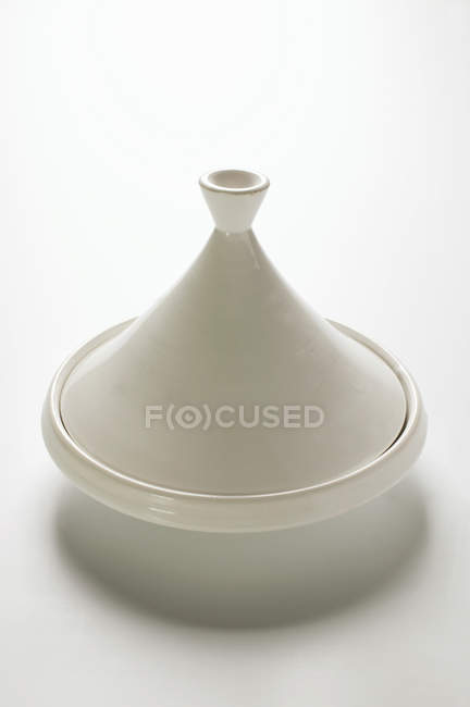 Closeup view of white Tagine dish — Stock Photo