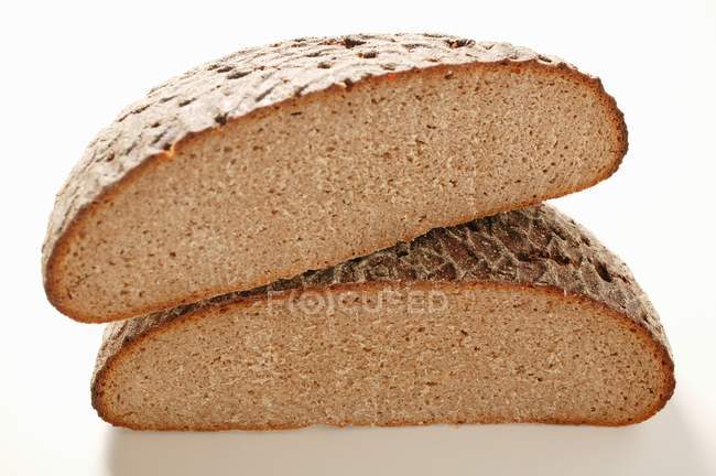 Halved rye bread — Stock Photo