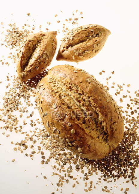 Wholemeal rolls with seeds — Stock Photo