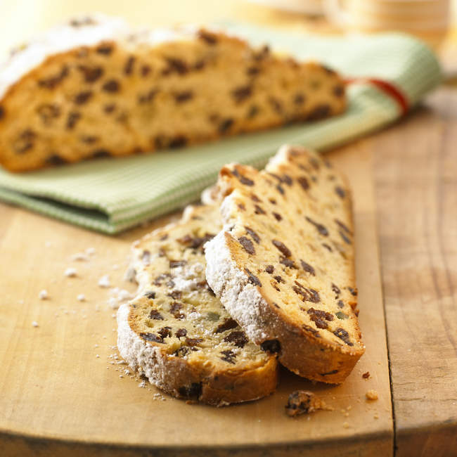 Slices of christmas  stollen — Stock Photo