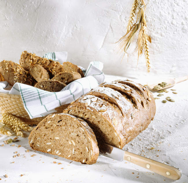 Partly sliced Sunflower seed bread — Stock Photo