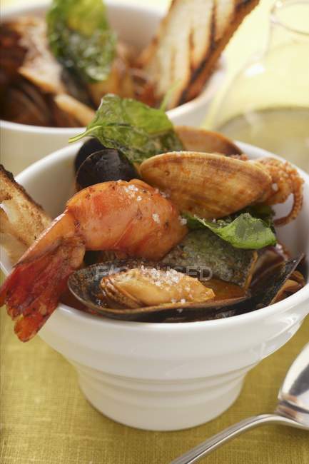 Soup with mussels, shrimps and tomatoes — Stock Photo