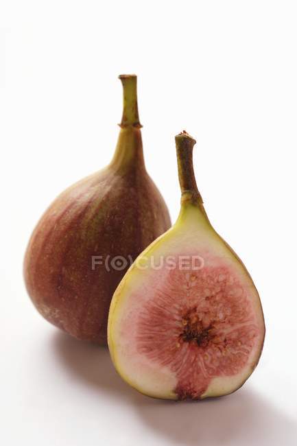 Fresh Whole and halved figs — Stock Photo