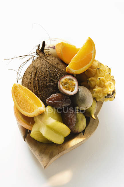 Exotic fruits with coconut — Stock Photo