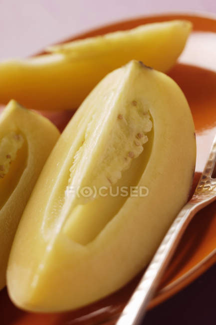 Wedges of pepino melon — Stock Photo