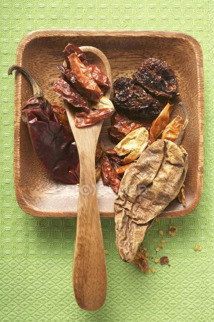 Various dried chili peppers — Stock Photo