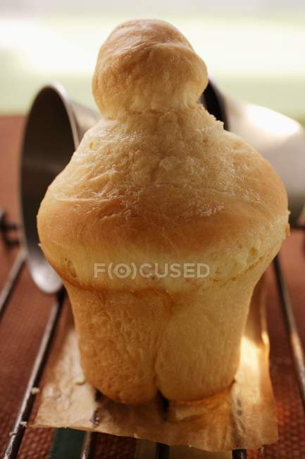 Closeup view of Brioche in front of baking tin — Stock Photo