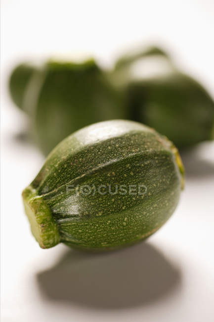 Green Round baby courgettes — Stock Photo