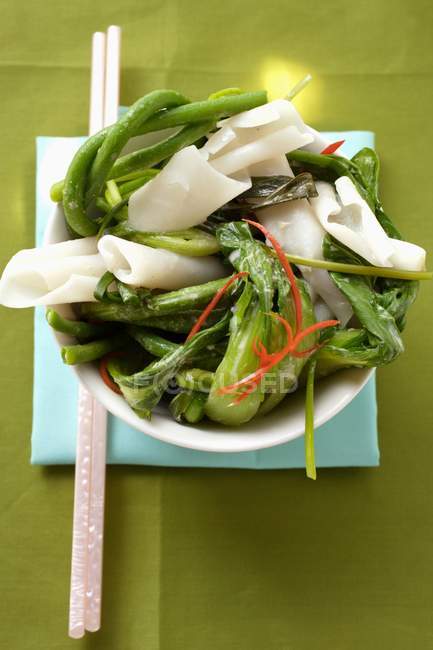 Rice noodles with pak choi — Stock Photo