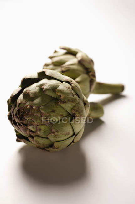 Two green artichokes — Stock Photo