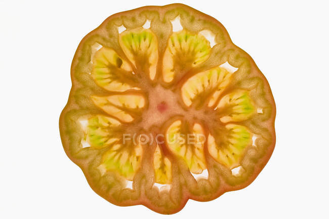 Scheibe gelbe Tomate — Stockfoto