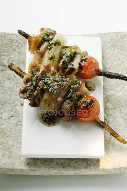 Barbecued pork kebabs — Stock Photo