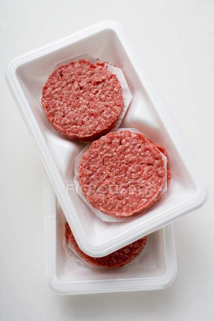 Hamburger crudi per hamburger — Foto stock