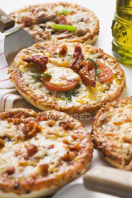 Three different mini-pizzas — Stock Photo