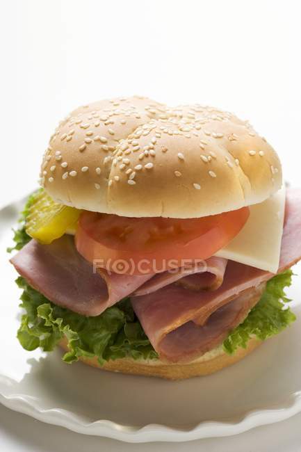 Sesame roll with ham — Stock Photo