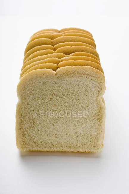Pan rebanado blanco - foto de stock
