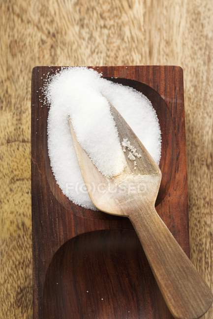 Salt in wooden bowl — Stock Photo