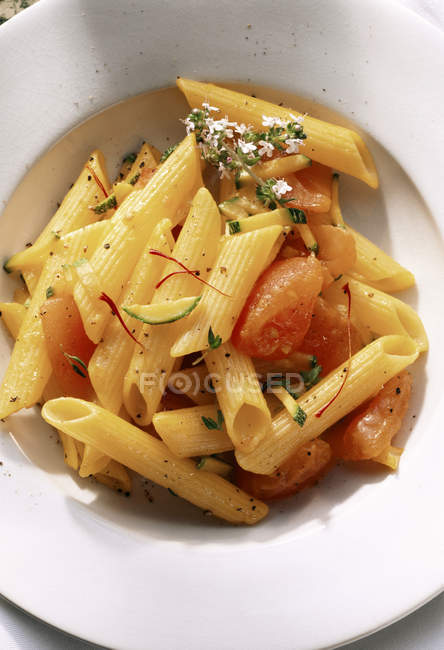 Penne pasta with tomatoes — Stock Photo