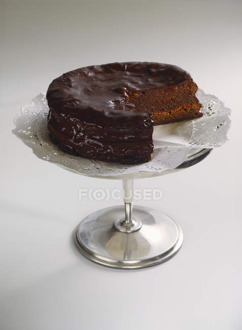 Sacher torte on silver stand — Stock Photo