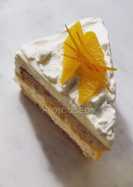 Closeup view of orange Gateau cake piece — Stock Photo