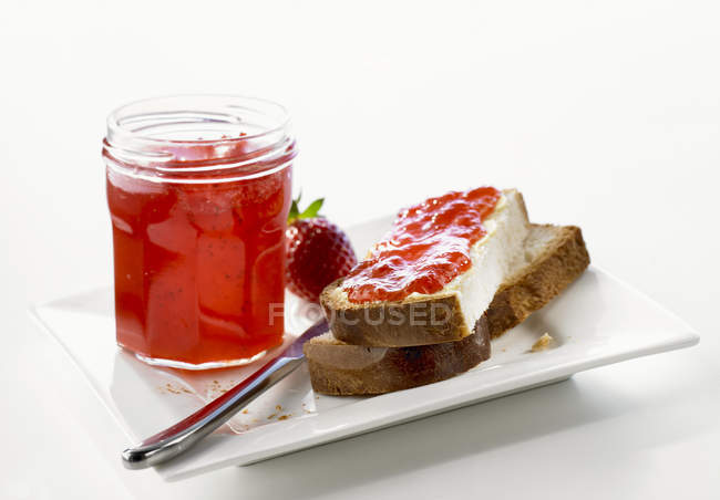 Strawberry jam in jar — Stock Photo