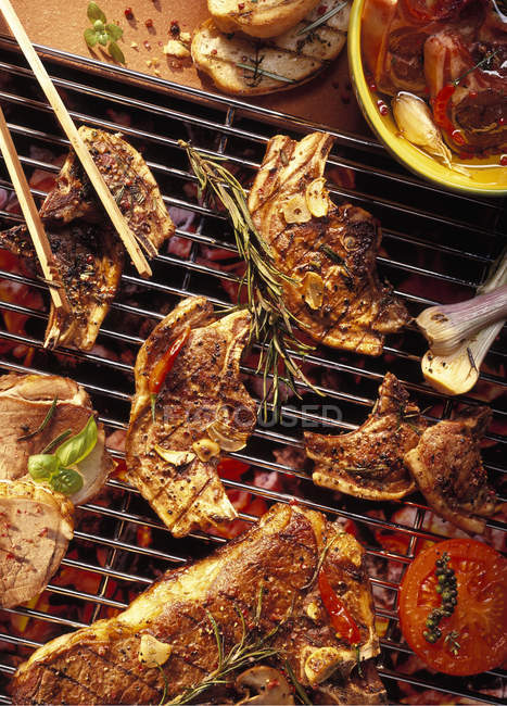 Grill rack with cutlets — Stock Photo