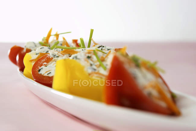 Peppers stuffed with soft cheese — Stock Photo